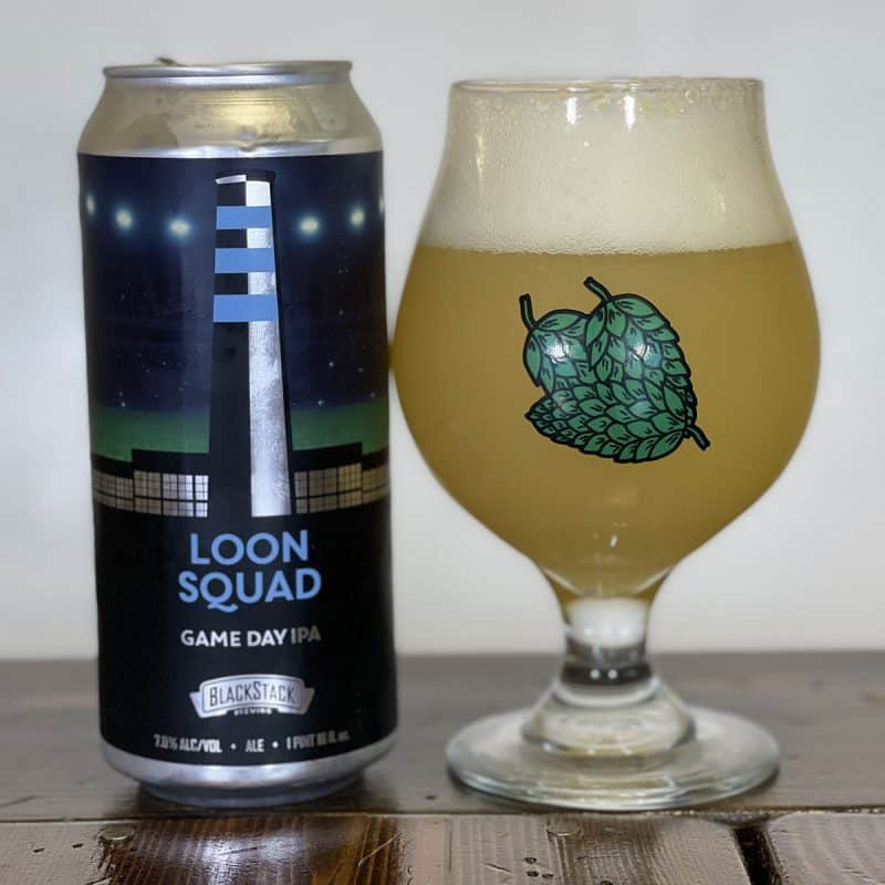 Can and glass filled with BlackStack Brewing Loon Squad Game Day IPA.
