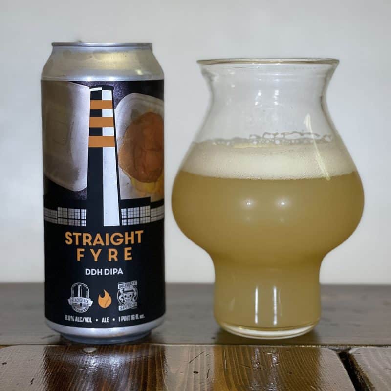 Beer glass and can of Straight Fyre, a double dry-hopped double IPA collaboration of BlackStack Brewing and The Private Sector podcast.