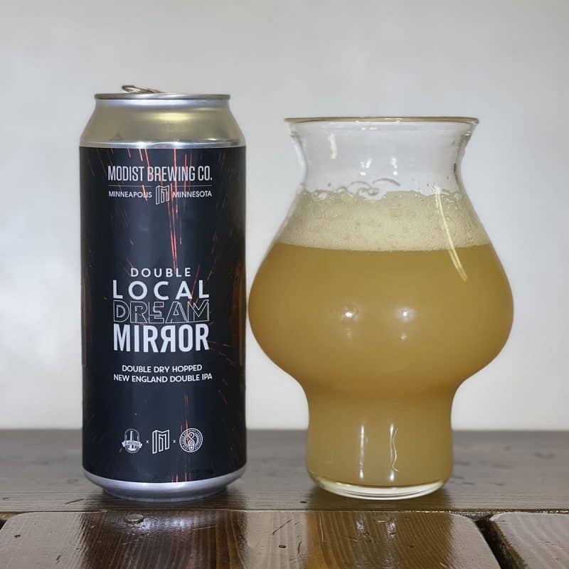 Pint glass and can of Modist Brewing Double Local Dream Mirror.