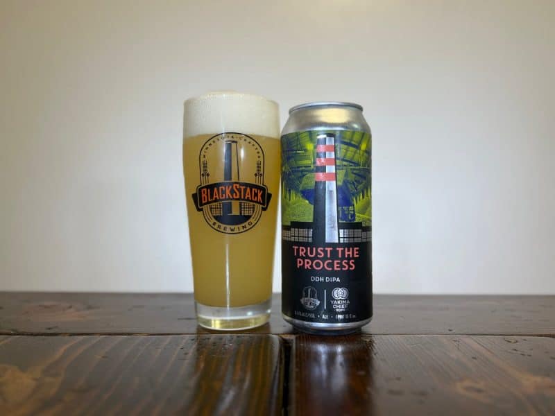 Can of BlackStack Brewing Trust The Process DDH DIPA next to a glass of beer.