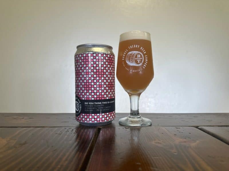 Crowler of Barrel Theory Do You Think This Is A Game? next to a glass of beer.