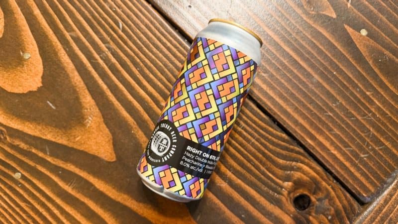 Can of Barrel Theory Right On 6th, Left On 7th laying on a wood table.