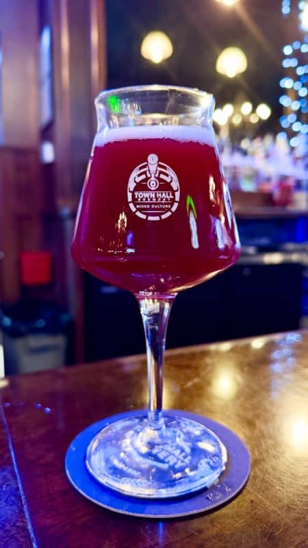 Brilliant glass of Town Hall Brewery MN Native Juliet M/C on the bar.