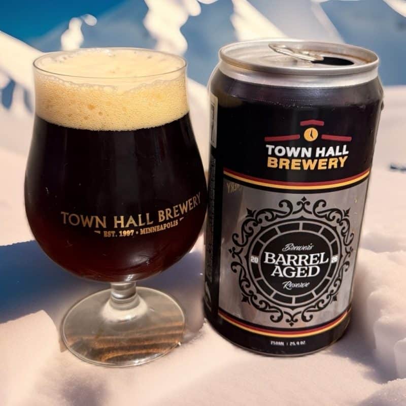 Snifter and crowler of Town Hall Brewery Twisted Rye in a snowy wonderland.